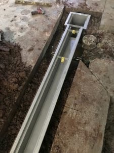 Install Trench Drain proper slope for drainage